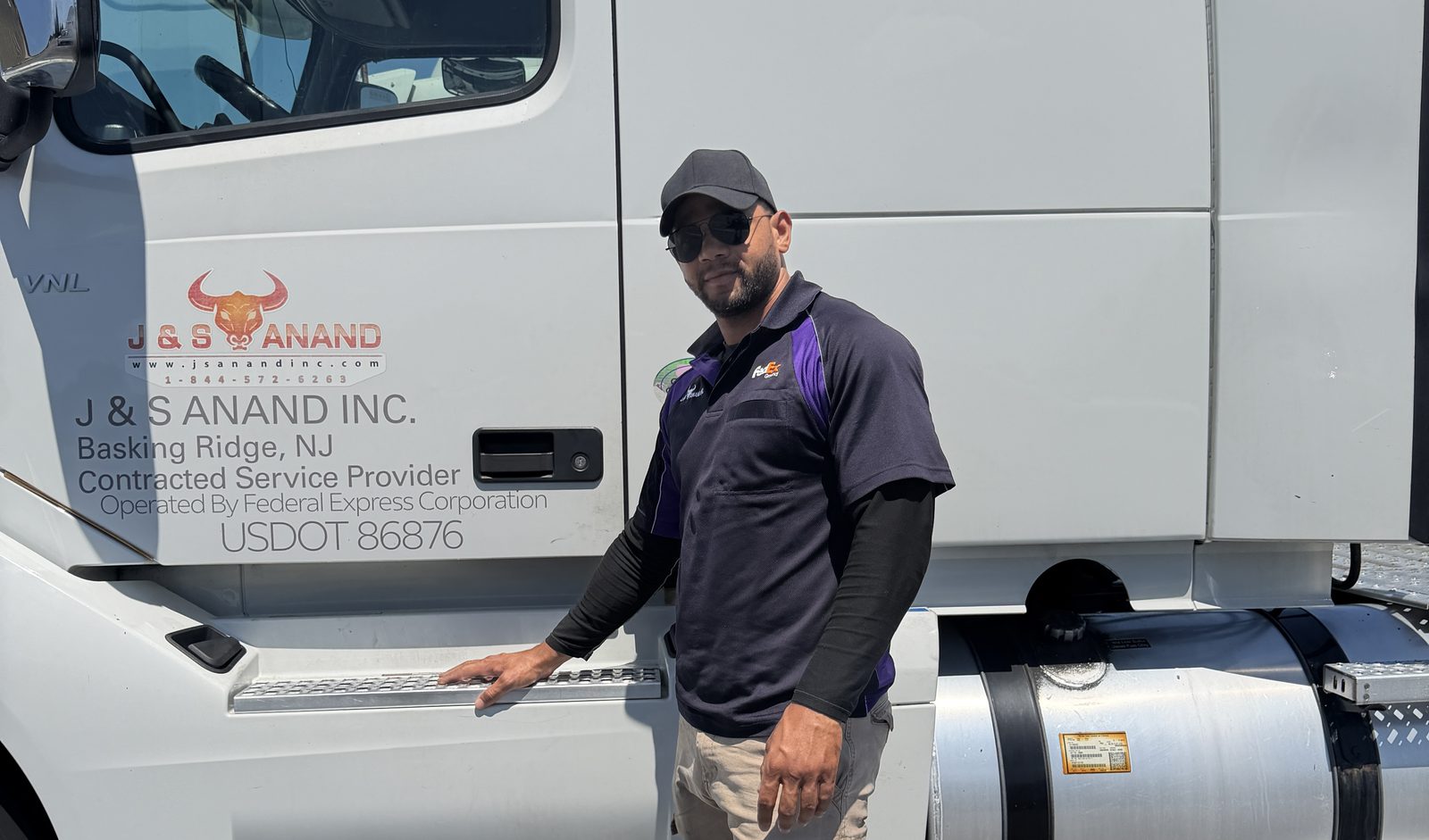 J&S Anand CDL-A driver with company truck